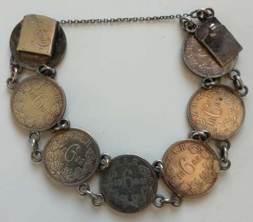 ZAR Paul Kruger Sterling silver arm bracelet with 7 Sixpence coins. Nice item.
