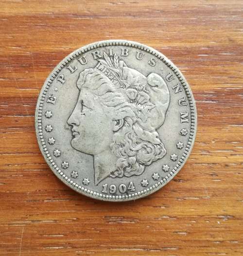 America 1904 Silver Morgan Dollar. ( I have more of these on my Bidorbuy)