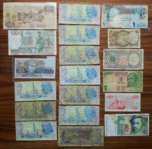 Collection of 19 old bank notes from around the world.