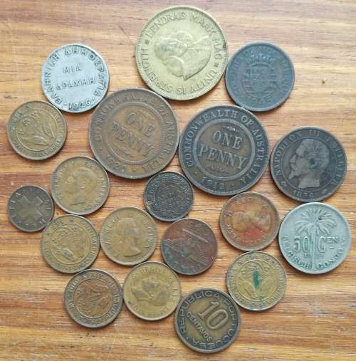 Collection of old coins from around the world.