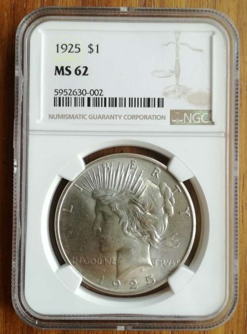 America 1925 NGC MS62 Silver Morgan Dollar.