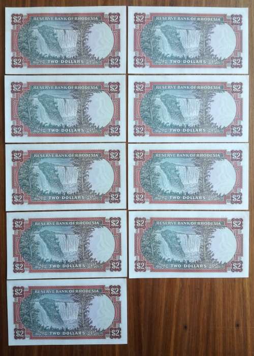 Rhodesia Salisbury 9 consecutive number bird watermark UNC-AUNC two dollar bank notes. Nice collecti