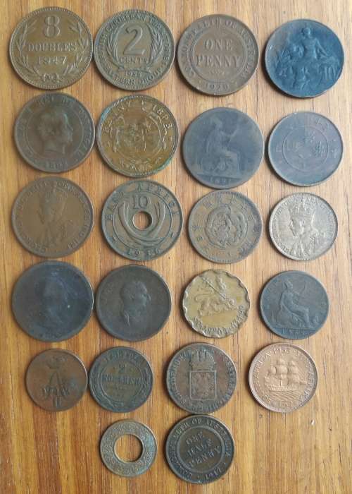 Collection of 22 old copper coins from around the world. Some good.