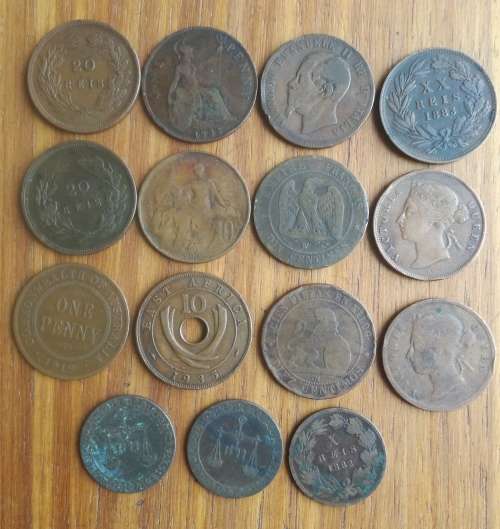 Collection of 15 old copper coins from around the world.