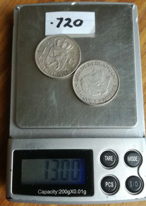Collection of 35 silver coins from around the world. 122.69 grams.