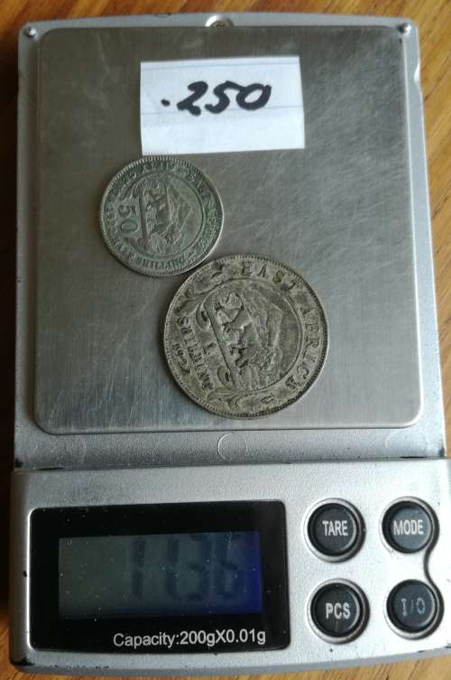 Collection of 35 silver coins from around the world. 122.69 grams.