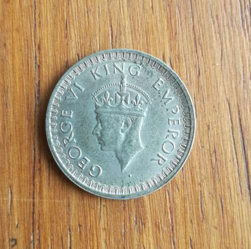 India 1943 Silver Half Rupie. Good condition.