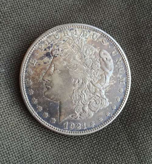 America 1921D Silver Morgan dollar. Good condition and nice toning.
