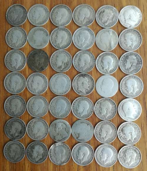 Great Britain collection of 42 Sterling silver three pence coins. 56.91 grams.