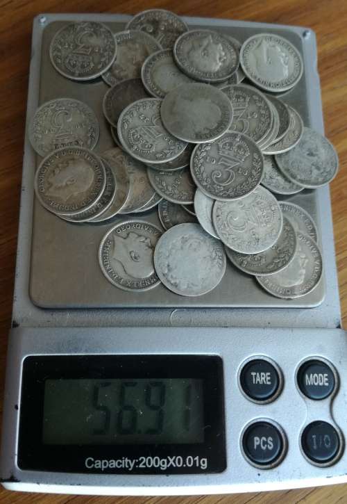 Great Britain collection of 42 Sterling silver three pence coins. 56.91 grams.