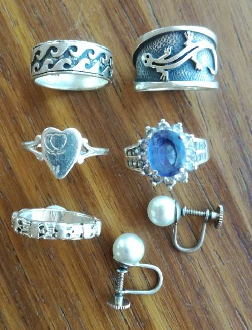 Collection of old silver rings and ear rings. Total weight is 24.77 grams.