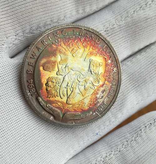 South Africa Silver Proof 1994 Conservation one rand. Beautiful toning.