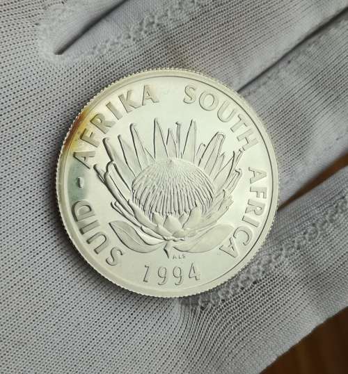 South Africa Silver Proof 1994 Conservation one rand. Beautiful toning.