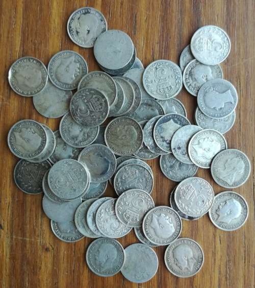 Great Britain Collection of 60 Sterling silver Threepence coins. 80.20 grams.