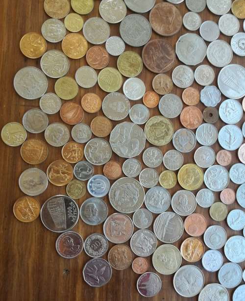 Large collection of 217 UNC-AUNC Coins from around the world.