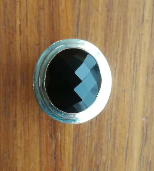 Beautiful sterling silver ladies ring with black stone.