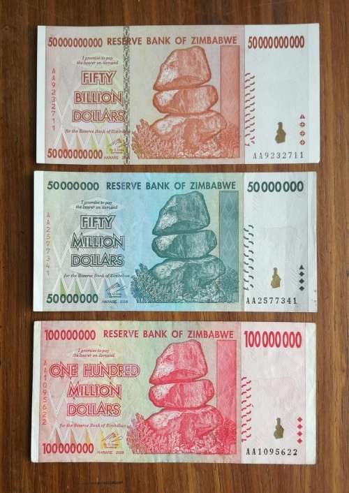 Zimbabwe Fifty Billion, Hundred and Fifty Million dollar bank notes.