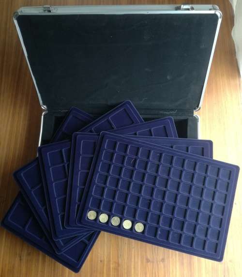 Coin holder briefcase. Holds 205 coins with keys.