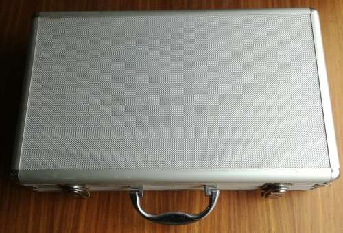Coin holder briefcase. Holds 205 coins with keys.