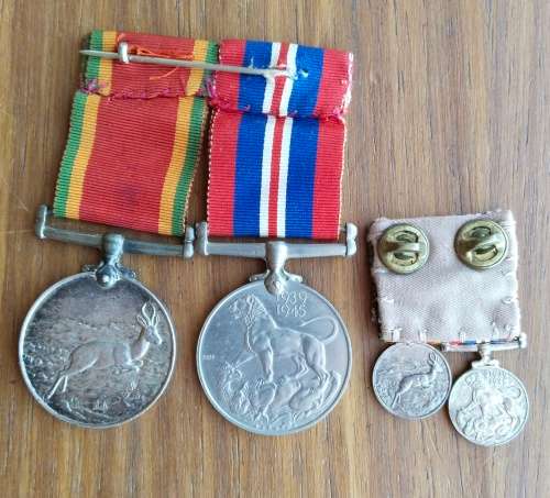 WW11 Group medals including miniature set awarded to 223640 C.G. DENNELL