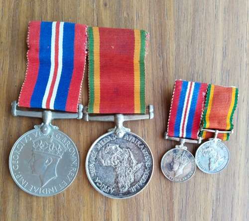 WW11 Group medals including miniature set awarded to 223640 C.G. DENNELL