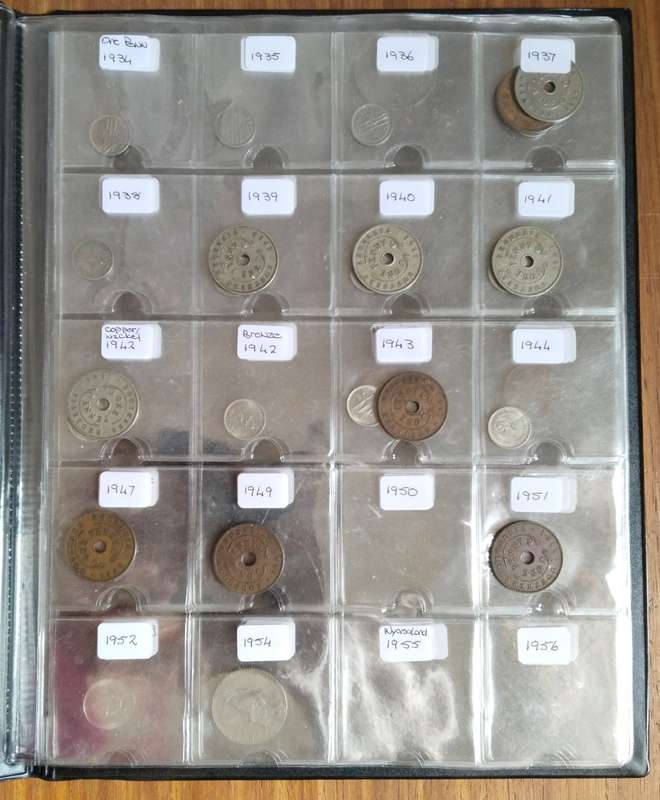 Rhodesia collection of 44 different coins in album. Some Good.