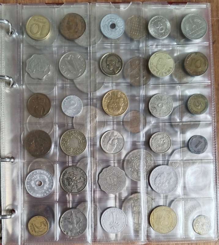 Collection of 91 old coins with album. Nice collection.