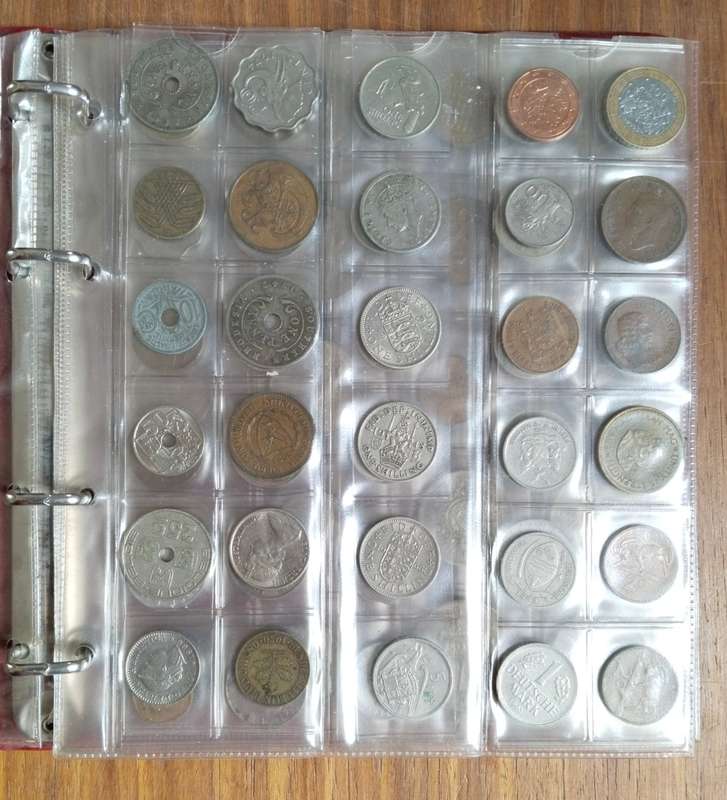 Collection of 91 old coins with album. Nice collection.