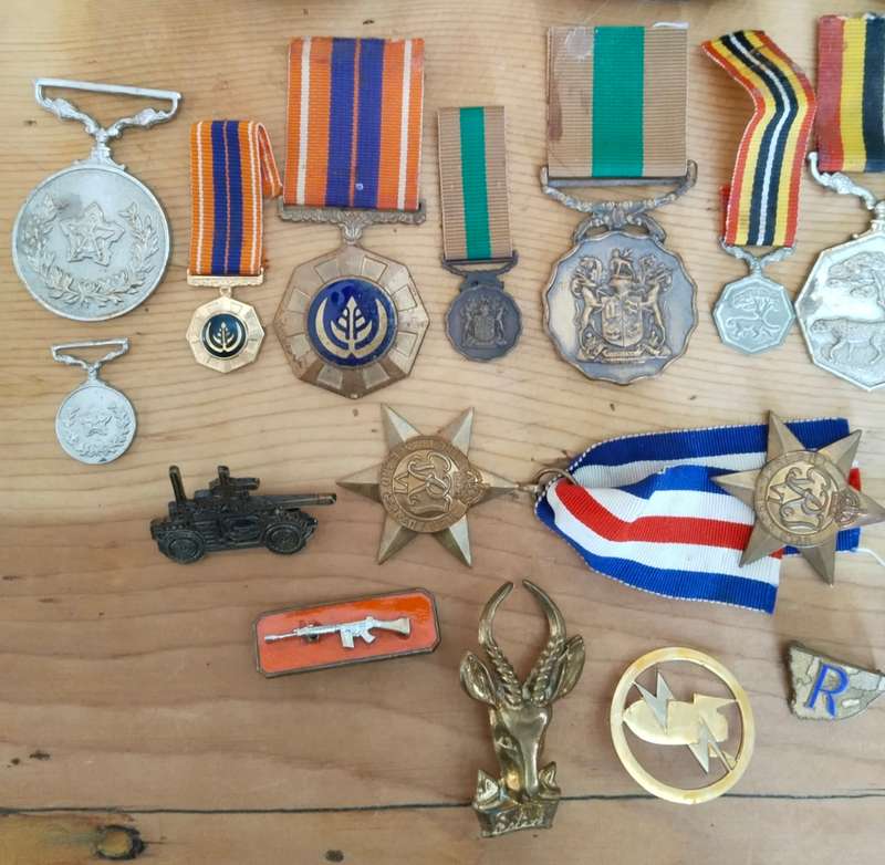 Large collection of military medals, badges and clothing. Please read.