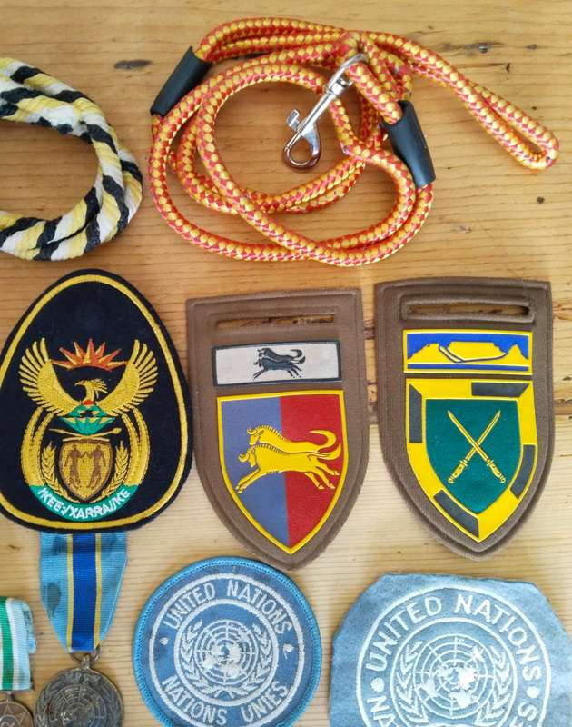 Large collection of military medals, badges and clothing. Please read.