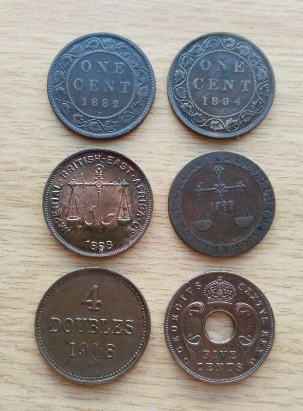 Collection of 6 old copper coins from around the world.