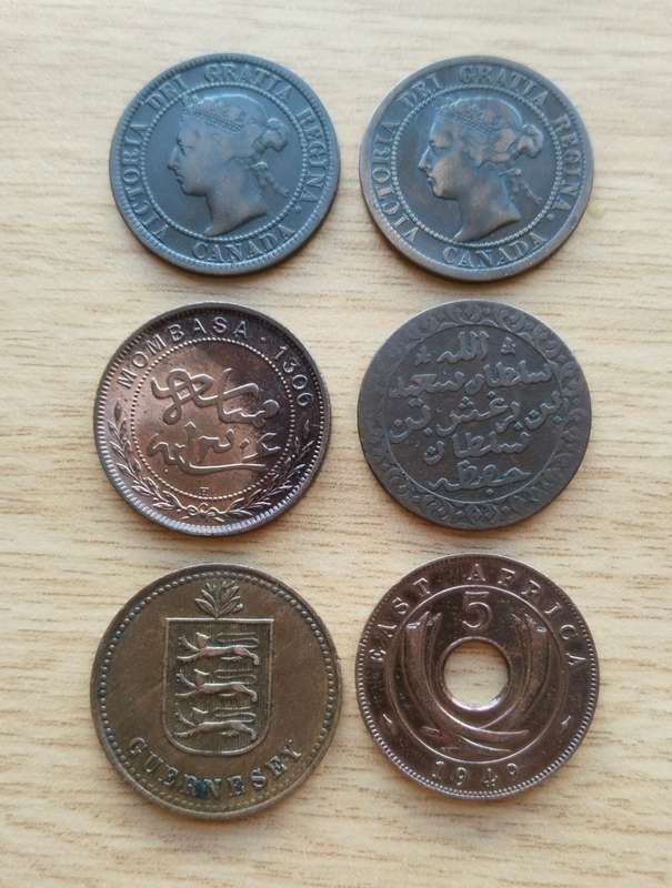 Collection of 6 old copper coins from around the world.