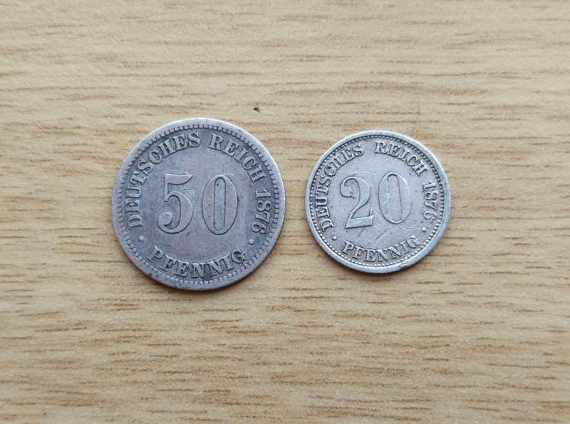 Germany 1876 B 50 Pfennig and 1876 J 20 Pfennig.