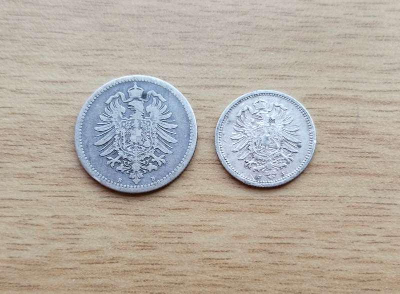 Germany 1876 B 50 Pfennig and 1876 J 20 Pfennig.
