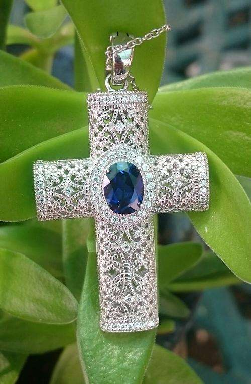 Beautiful sterling silver necklace with cross and sapphire and cubic zirconia stones