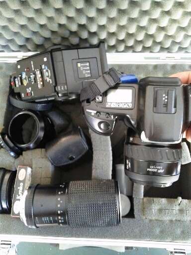MINOLTA MAXXUM 300 SI  CAMERA WITH  LENS FILTERS ON ALUMINIUM CARRY CASE