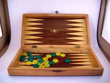 Backgammon on  wood box aprox 300mm long x 150 wide
