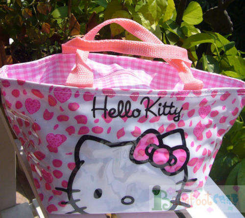 Hello Kitty bag polka dot and heart pink background pattern with hello kitty head