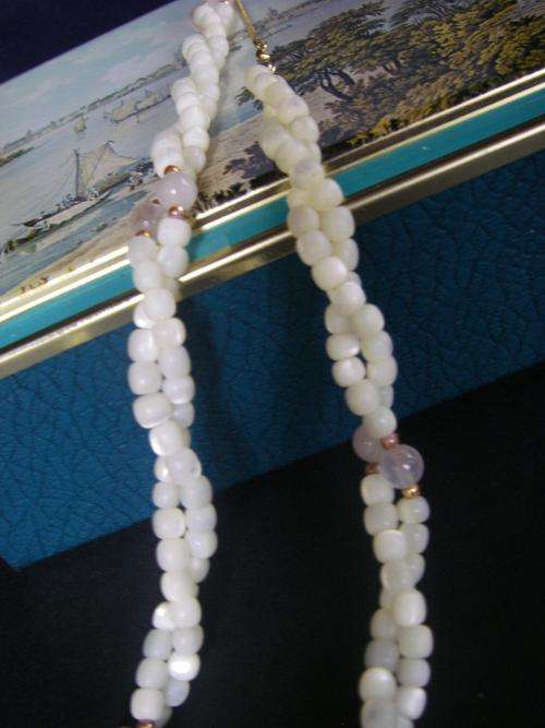 vintage white  pearl coloured beads interspersed with lilac beads - 2 strands twisted from 50's