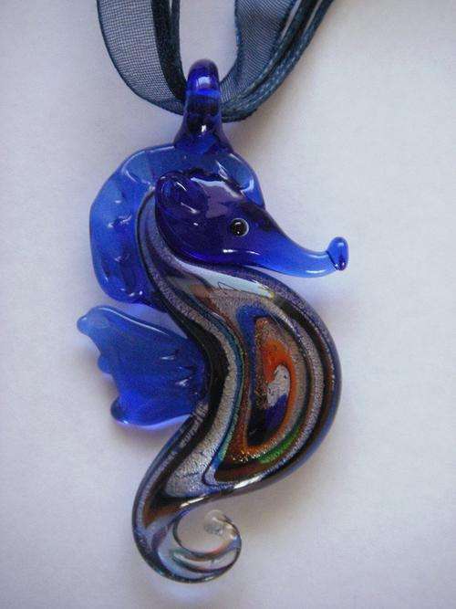 Midnight blue gold star dust handmade seahorse pendant with inlaid circular patterns