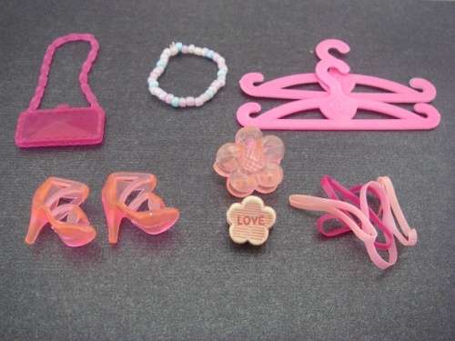 Pink Personal accessory packs for Barbie dolls, necklace, coat hangers, hair clips, shoes, handbag
