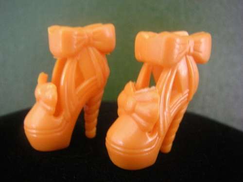 Orange Barbie doll shoes with ankle bow