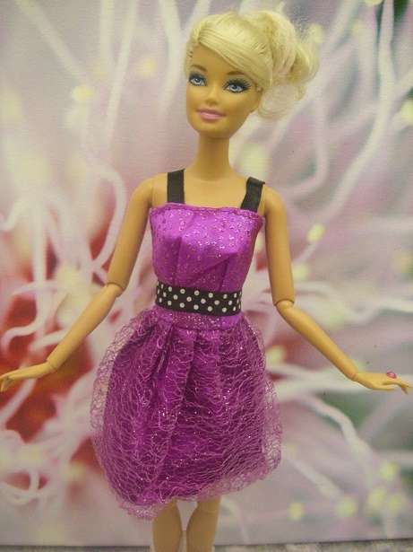 Stunning rich purple glittery cocktail dress with black & white polka dot waist belt