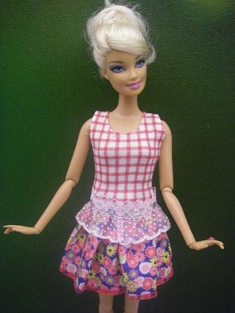 Pretty summer dress with red & white checked bodice and floral skirt