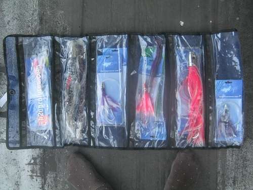 www.h2oprolures.com 36 Fishing Lures  unused still in packets & carrying bags sea fishing