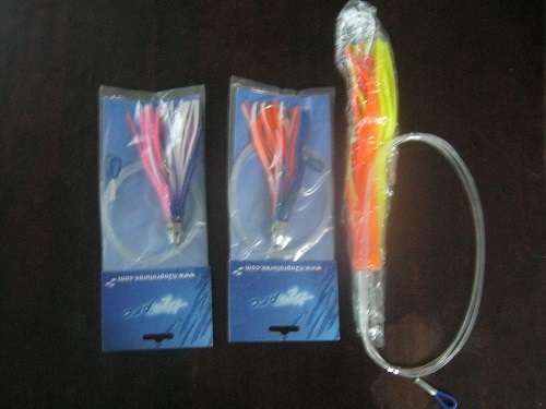 www.h2oprolures.com 36 Fishing Lures  unused still in packets & carrying bags sea fishing