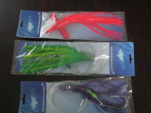 www.h2oprolures.com 36 Fishing Lures  unused still in packets & carrying bags sea fishing