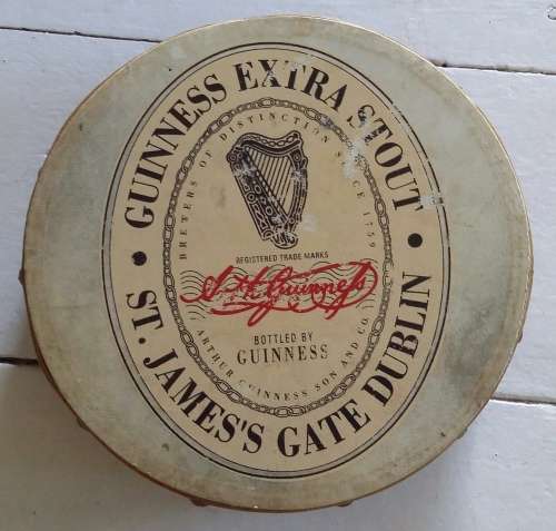 Real Irish Bodhiran, a 21 cm  wood and skin drum with Guinness emblem on front,