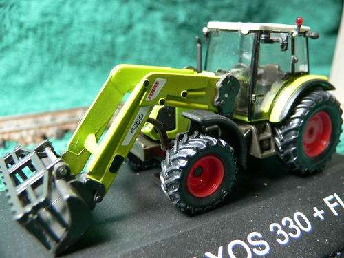 HO scale Schuco tractor with frontend loader.
