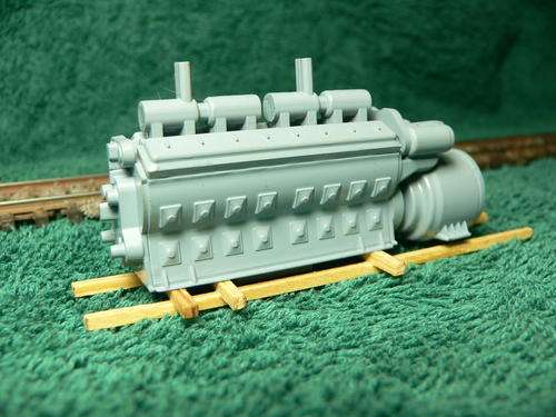 HO scale mother of all diesel engines freight load. Have a look.